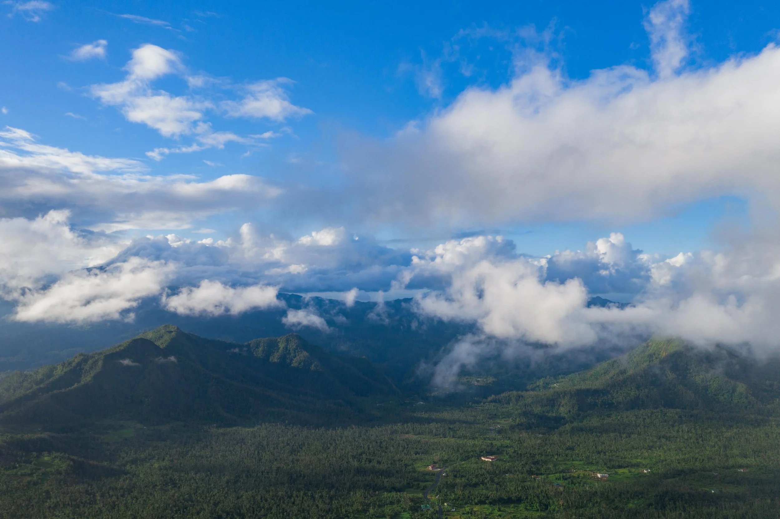 A cinematic view across Dominica's mountain landscape